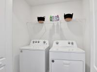 Full-size washer and dryer at a home for rent in Apopka, Florida.