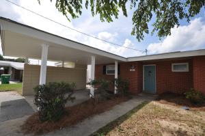 Home exterior with carport