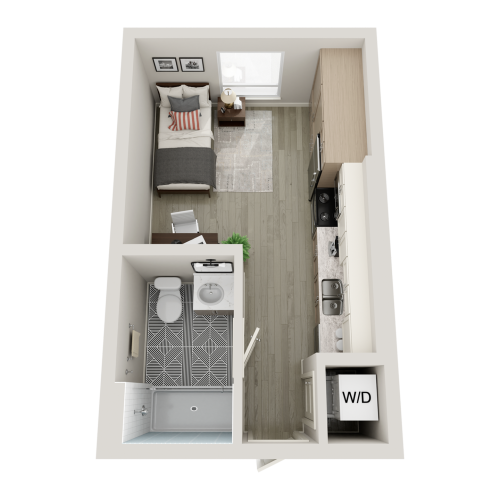 Studio floorplan with a bed, desk, full kitchen, full bathroom, storage closet, and washer dryer.
