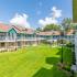Community courtyard filled with green space and a picnic area.