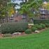 Exterior Brick Apt Building with Balconies and Patio, and landscaping
