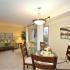 Dining Room with chandelier, Living Room with walkout patio