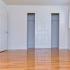 Bedroom with Large Closet and Hardwood Floors