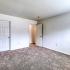 Americana Southdale Apts; interior, bedroom with walk-in closet, plush carpet, window in bedroom with custom blinds