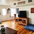 Living area | TV | Wood floors | Fort Cavazos Military Housing | homes for rent in killen tx
