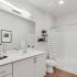 guest bathroom vanity with mirror