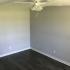 Newly painted living room with vinyl plank flooring