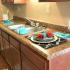 Kitchen counters and dark brown cabinets