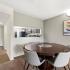 Dining Area: table, chairs, new carpet, view into kitchen
