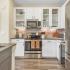 white kitchen cabinets and finishes