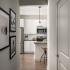 view of kitchen from long hallways