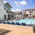 pool with sunbathing chairs