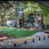 Nicely landscaped area with two benches
