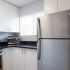 Kitchen with Stainless Steel Appliances and Black Granite Counters