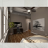 Crescendo Apartments, interior, bedroom, industrial style cement and brick walls, wood flooring, large windows, large bed, ceiling fan, desk, chair, laptop, mini tree