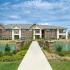 Walking path over the interior pond | The Enclave at Mira Lagos  | Apartments Grand Prairie TX