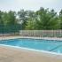 Community swimming pool and sun deck at Oak Tree Apartments in Newark, DE.