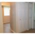 Bedroom with beige carpet and a closet at Chesapeake Village apartments for rent in Middle River, MD