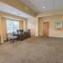 Interior of the leasing and management offices furnished with desks and computers at Woodland Plaza Apartments in Wyomissing, PA.