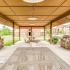 Picnic area under pavilion with gas grills | Campus Lodge | Student Apartments Columbia, MO