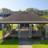 Pavilion with picnic tables set in Beautifully Landscaped Grounds | Village at Midtown | Apartments in Mobile, AL