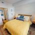 Spacious bedroom with attached bath in our one bedroom Triton Cay Fort Myers