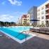 Resort style swimming pool with cabanas at The Parq at Chesterfield Apartment Homes, Chesterfield, MO 63017