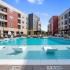 Resort style swimming pool with cabanas at The Parq at Chesterfield Apartment Homes, Chesterfield, MO 63017