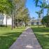 Beautifully landscaped grounds with brick walkways.