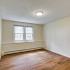 Bedroom with hardwood-styled flooring