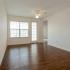 Large open living area with wood plank flooring