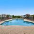 Beautiful sparkling pool with lounge chairs