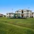 Large green space courtyard with childrens play area