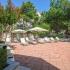 Lounge Area with Umbrellas | St. Moritz Apartments in Dallas, TX