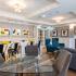 Angled View of Dining Room, Family Style Dining Table or Work From Home Space and Resident Lounge Seating at Canton Woods apartments in MA