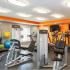 Circuit Training Equipment with Cardio Machines and Stretching Equipment in Background | Canton Woods apartments in MA