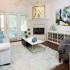 Spacious Living Rooms with Fire Places | St. Moritz Apartments in Dallas, TX