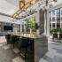 resident dining area with pool view and tv entertainment area