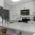 Kitchen with beautiful white cabinetry and stainless appliance package.
