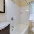 Full bathroom at Harvard Village Apartments in Adams Morgan