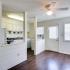 Dining room/kitchen with white appliances