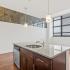 floating kitchen island in the loft 1 bedroom