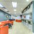 Coffee bar, seating, and tables at The Club at Chandler Crossings | MSU Off-Campus Apartments in East Lansing.