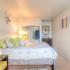 Bedroom showing storage, carpeted floors at The Club at Chandler Crossings | MSU Off-Campus Housing .