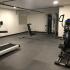 Draper Lofts Apartments, interior, fitness center, treadmills, elliptical, weight machines