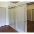 Homeroom Lofts Apartments, interior, bedroom, sliding doors, wood flooring