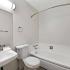 bathroom sink, shower, and toilet
