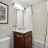 bathroom sink, shower, and toilet