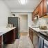kitchen with stainless steel appliances and wood cabinets