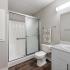 bathroom sink, shower, and toilet